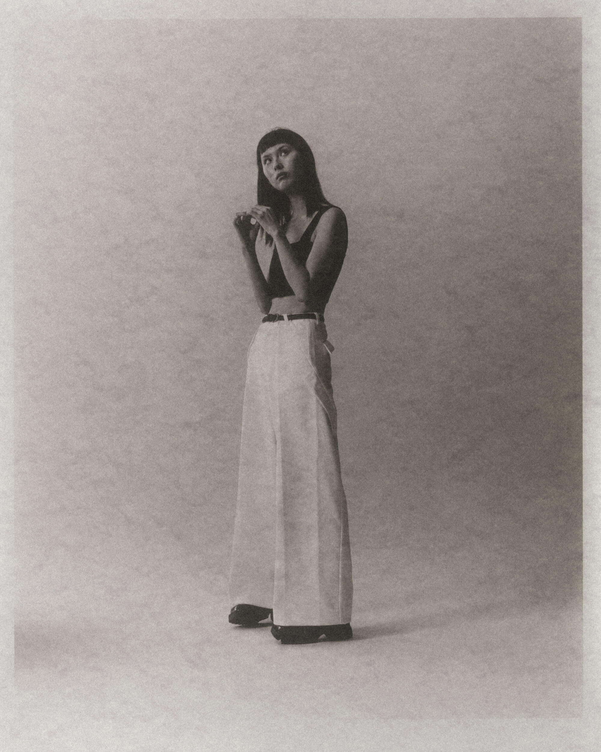 Bao pondering life in the studio